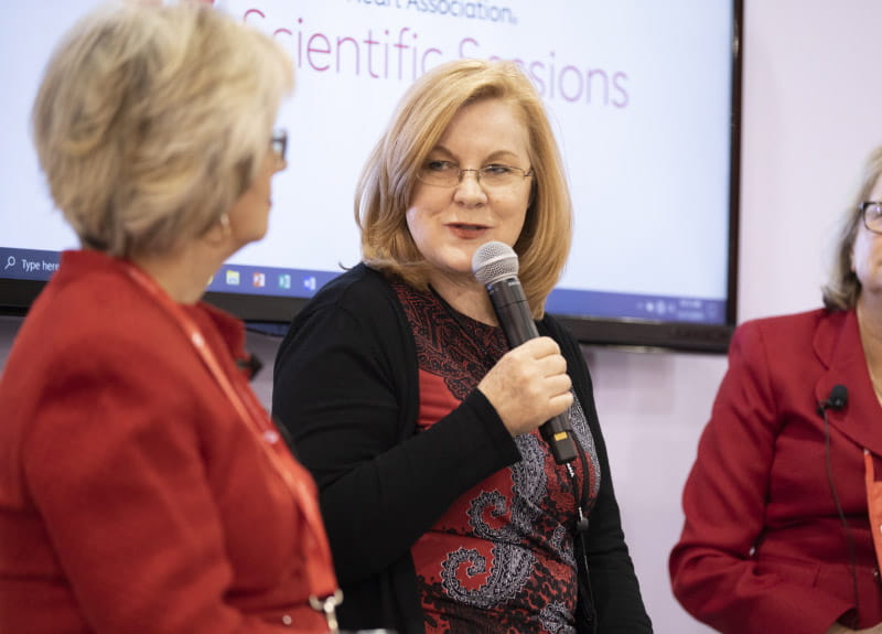 Dr. Gina Lundberg speaking during the